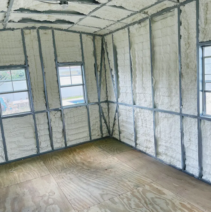 Closed-cell spray foam insulation applied to wall cavities in a residential project in Groveport